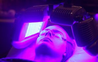 Dermalux Tri-Wave MD LED Phototherapy – SKIN lounge Aesthetics Richmond Client enjoying a Dermalux Tri-Wave MD LED Phototherapy treatment at SKIN lounge Aesthetics Richmond, using advanced LED light energy to boost collagen, reduce inflammation, and promote radiant skin.
